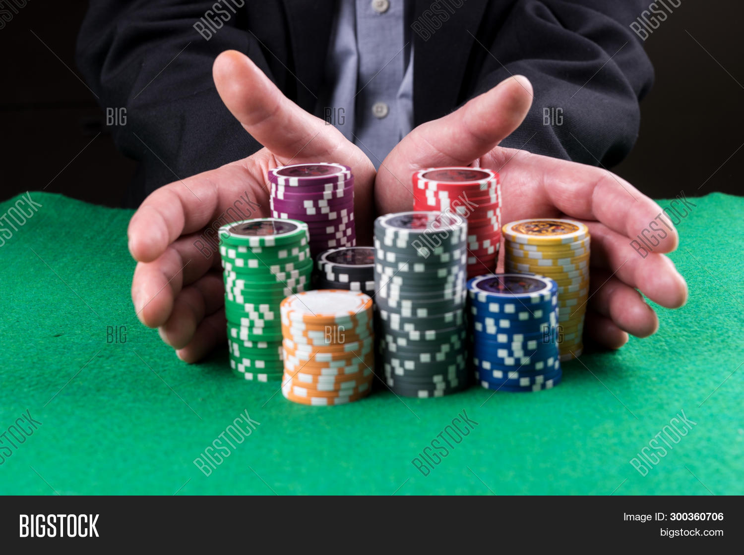 addiction,all,bet,betting,blackjack,card,casino,chance,chip,closeup,concept,dealer,entertainment,fortune,forward,gamble,gambler,gambling,game,gamer,green,hand,hazard,heap,hold,holdem,jackpot,leisure,lifestyle,luck,male,man,men,people,person,pile,play,player,poker,pushing,risk,stack,stakes,success,table,vegas,win