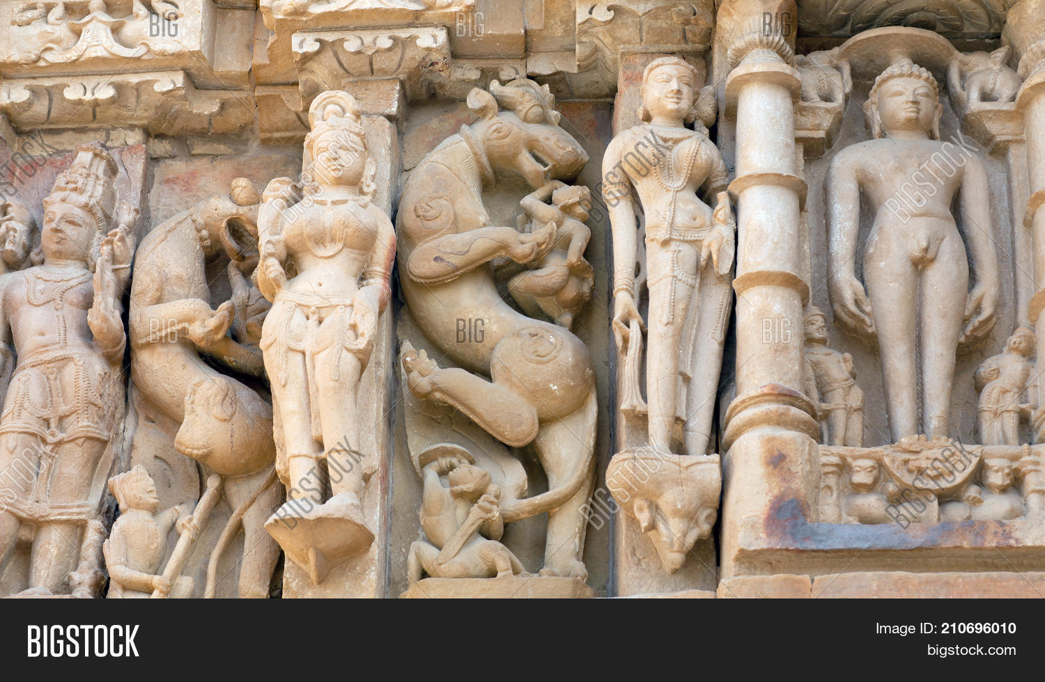 adinath,apsara,architecture,art,asia,background,bas-relief,building,carved,culture,decor,decorated,detail,erotic,famous,figure,hinduism,india,indian,jainism,journey,kama,kamasutra,kandariya,khajuraho,landmark,madhya,mahadev,mahadeva,mandir,monument,national,outdoor,parvati,pradesh,religion,sandstone,sculpture,shiva,sightseeing,statue,sutra,temple,texture,tour,tourism,traditional,travel,unesco,wall