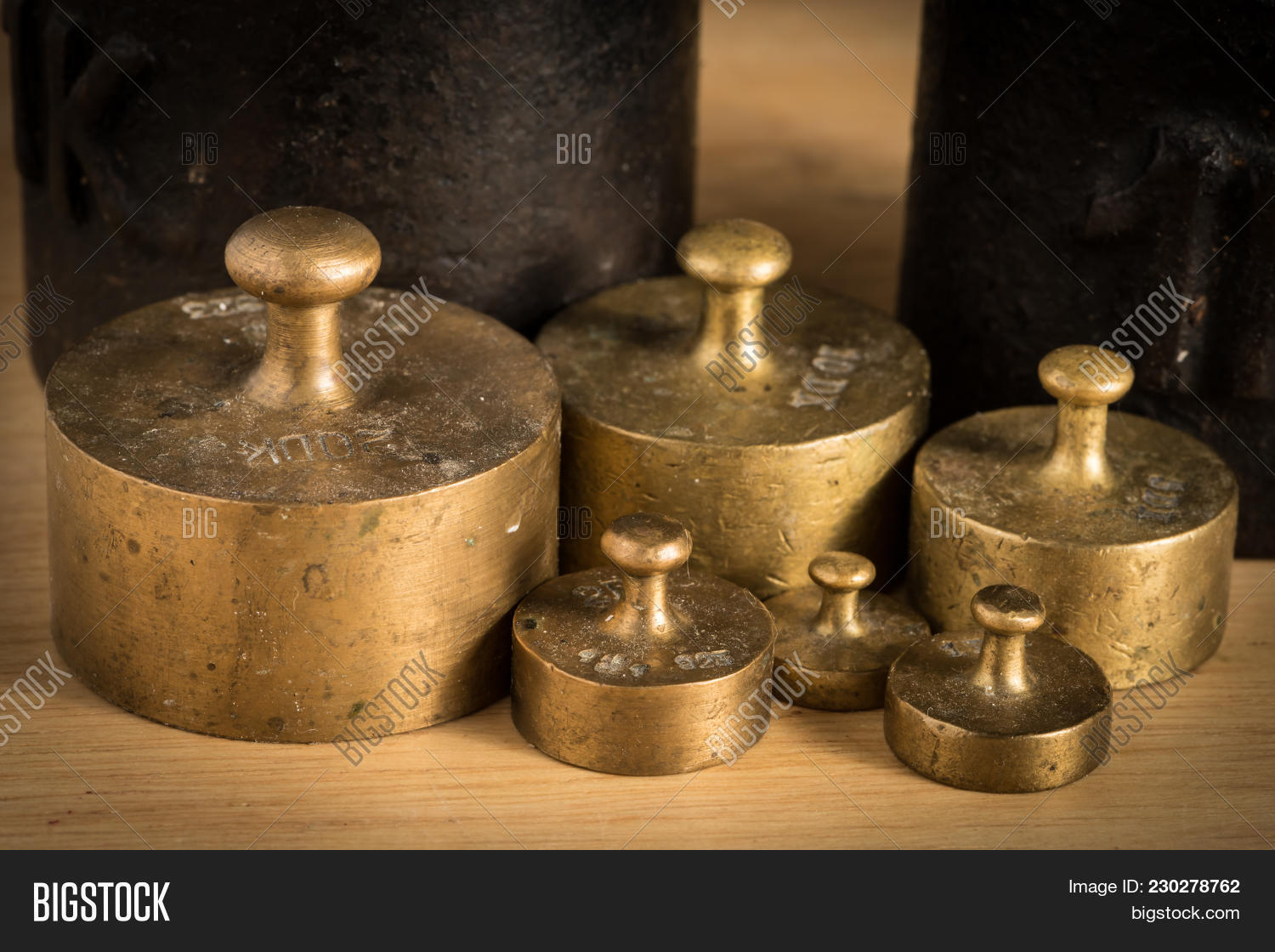 1kg,accurate,ancient,antique,background,balance,black,brass,bronze,brown,calibration,concept,conceptual,device,gold,gram,heavy,iron,kilogram,mass,measure,measurement,metal,old,one,precision,retro,rustic,rusty,scale,small,table,traditional,unit,vintage,weigh,weighing,weight,white,wood