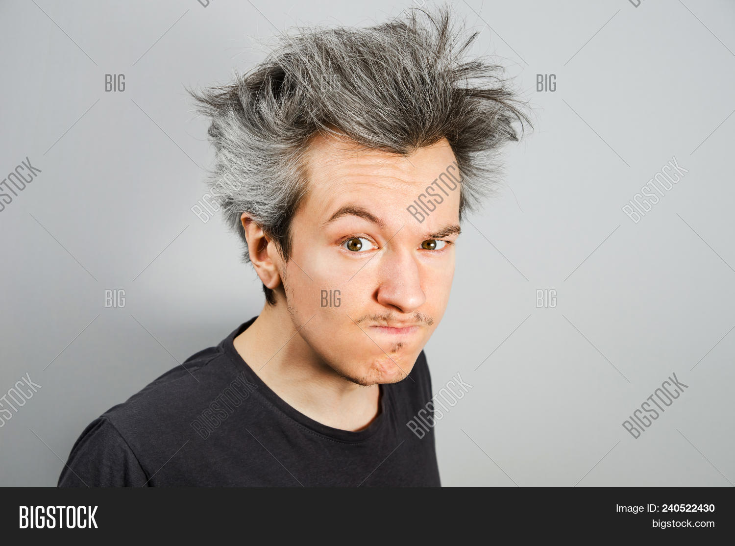 Unshorn And Unshaven Young Guy On Gray Background 240522430