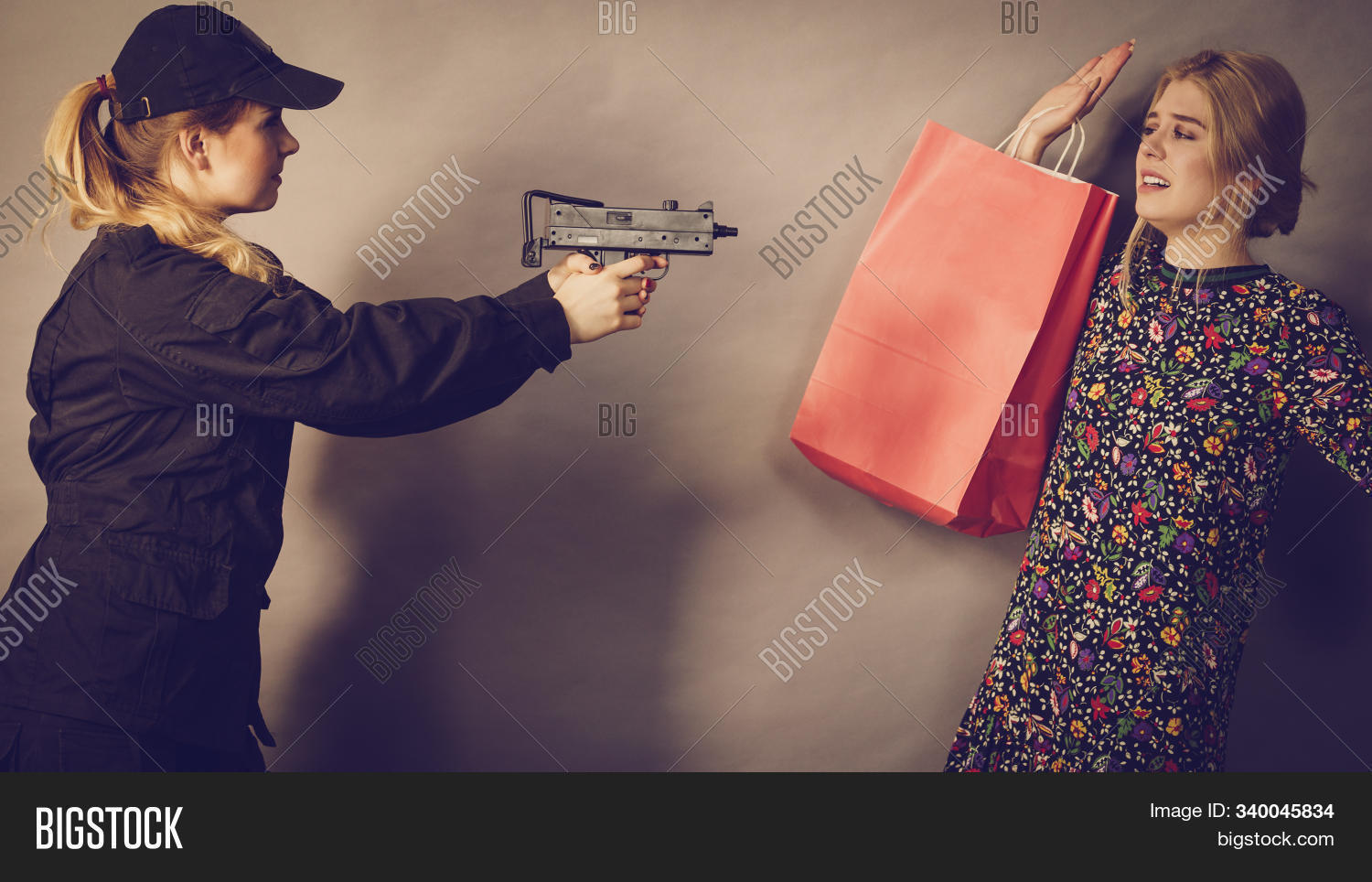 arrest,bad,bag,buy,buying,clothes,clothing,cop,crime,girl,guard,gun,law,officer,person,police,problem,prosecuted,retail,security,shop,shoplifting,shopllifter,shopping,steal,stealing,store,theft,thief,woman