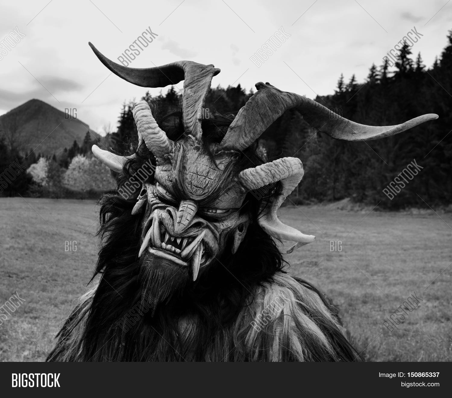 krampus,scary,beast,mask,alpine,austria,hell,man,costume,krampuslauf,people,horn,spooky,symbol,anti,santa,christmas,tradition,germany,alps,slovenia,czech,hungary,crone,monster,outdoor,devil,cruel,ceremony,catholicism,fun,intimidation,day,demonic,satan,holiday,nicholas,demon,sin,one,hag,folklore,dreadful,mountain,horror,punish,nature,europe,portrait,black,white