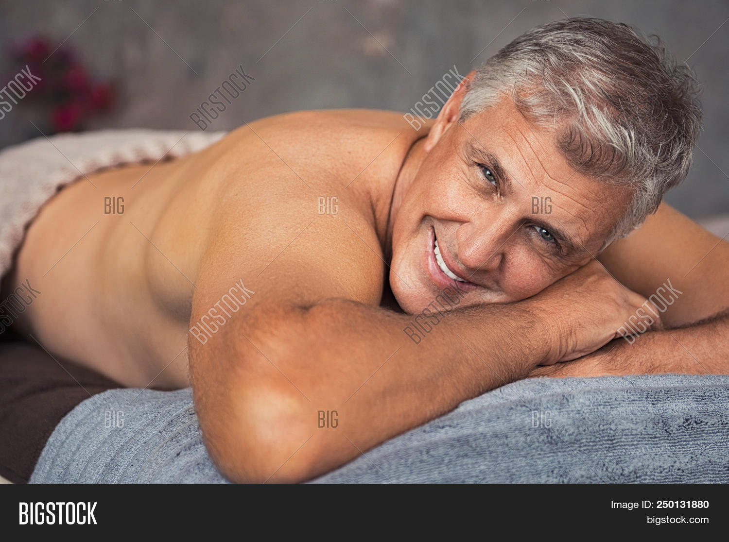 aged,ayurveda,back,beauty male,body,body care,care,elder,elderly,grey hair,handsome,happy,health,healthy,lie,looking,looking at camera,male,man,massage,massage table,massaging,mature,matured,mid adult man,naked,naked man,old,one,people,person,physiotherapy,pleasure,relax,rest,resting,retired,salon,senior,senior man,skin,smile,spa,therapy,toothy smile,treatment,wellbeing,wellness