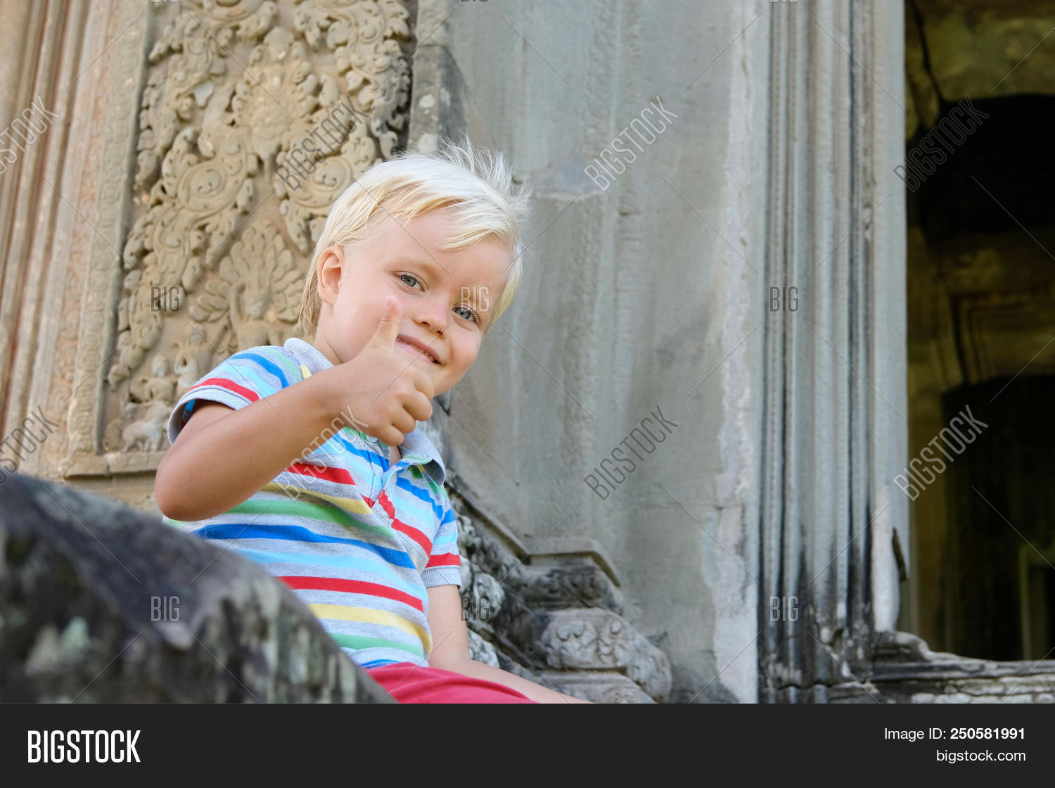 4,5,ancient,angkor,attractive,baby,background,blonde,boy,caucasian,cheerful,child,childhood,color,cute,day,eyes,face,four,funny,hair,handsome,happy,kid,lifestyle,little,look,natural,nice,old,one,outdoor,person,portrait,ruin,sitting,smile,smiling,son,summer,sunny,tan,temple,thumbs,tourist,travel,up,vacation,years,young