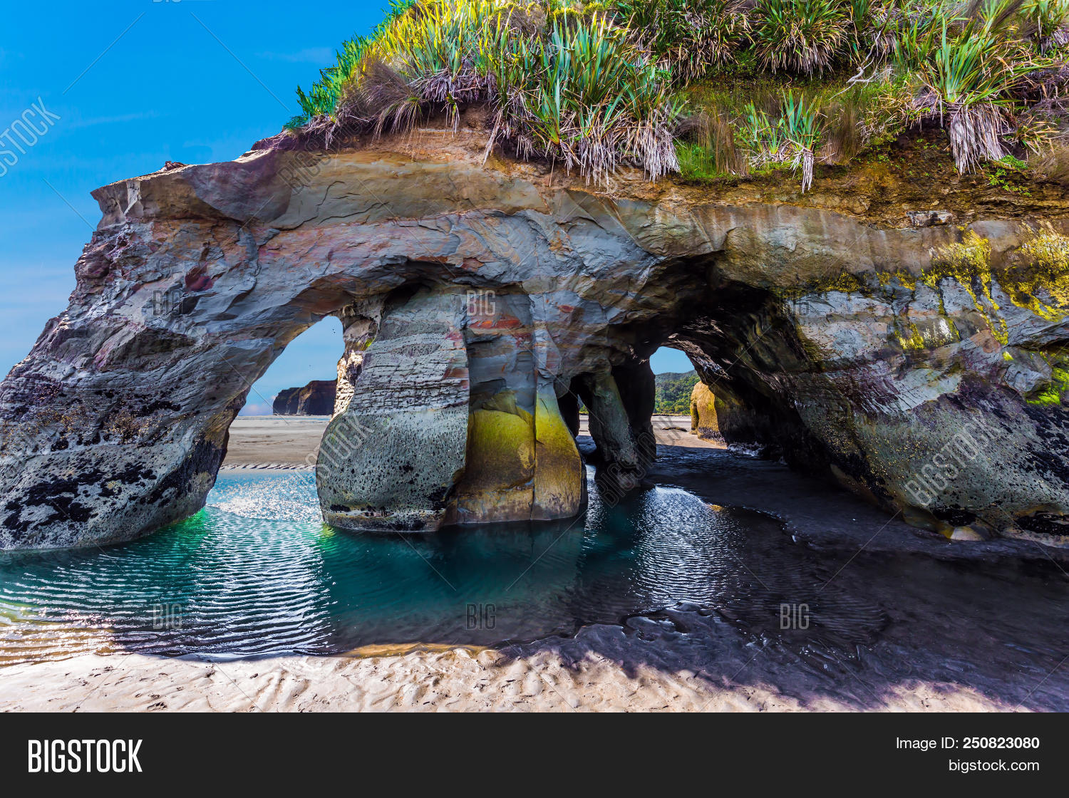 active,arches,attractions,beach,blue,bluffs,cliffs,coast,coastal,coastline,concept,ecological,elephant,exotic,grandiose,holiday,journey,landscape,low tide,march,nature,new zealand,north island,ocean,pacific,photo tourism,rock,sea,seascape,season,sheer,sky,spectacular beach,stones,three sisters,tongaporutu,travel,water,wild