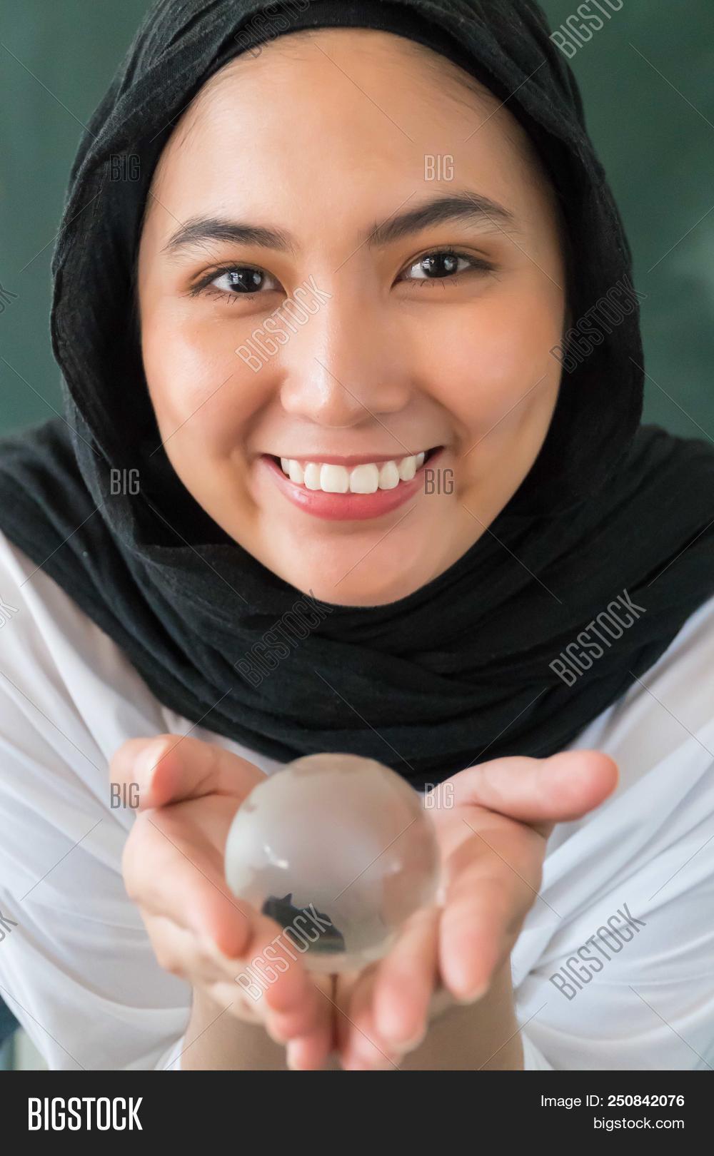 adult,arab,arabian,asian,attractive,beautiful,beauty,business,call,cheerful,communicate,communication,confidence,corporate,culture,diversity,ethnic,ethnicity,executive,face,female,girl,happy,hijab,indonesian,internet,islam,islamic,job,laptop,look,malay,malaysian,melayu,modern,muslim,muslimah,outdoor,people,person,phone,portrait,scarf,smile,technology,tradition,traditional,veiled,woman,women