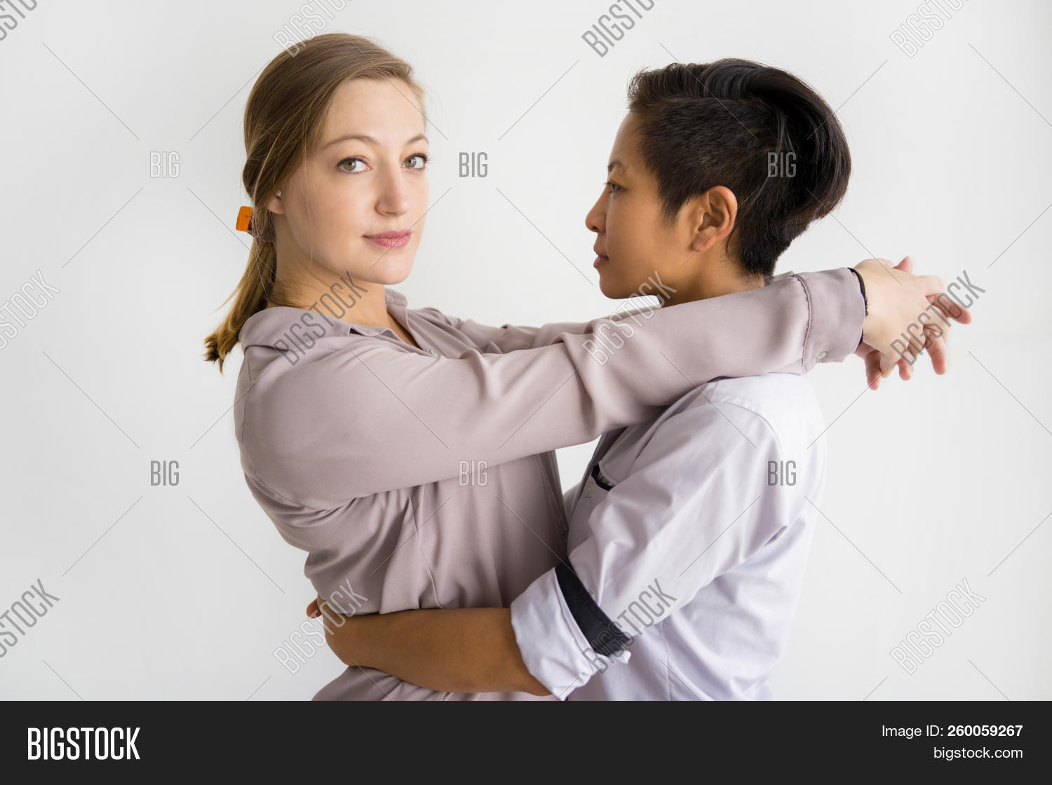 Asian,Caucasian,adult,attractive,background,bisexual,blouse,calm,camera,casual,concept,content,couple,dating,diverse,embracing,family,feeling,female,friend,girl,girlfriend,group,homosexual,horizontal,hugging,lady,lesbian,lgbt,lifestyle,looking,love,multi-ethnic,passion,people,portrait,posing,relationship,romance,serious,shirt,side,standing,studio,tenderness,together,transgender,two,woman,young