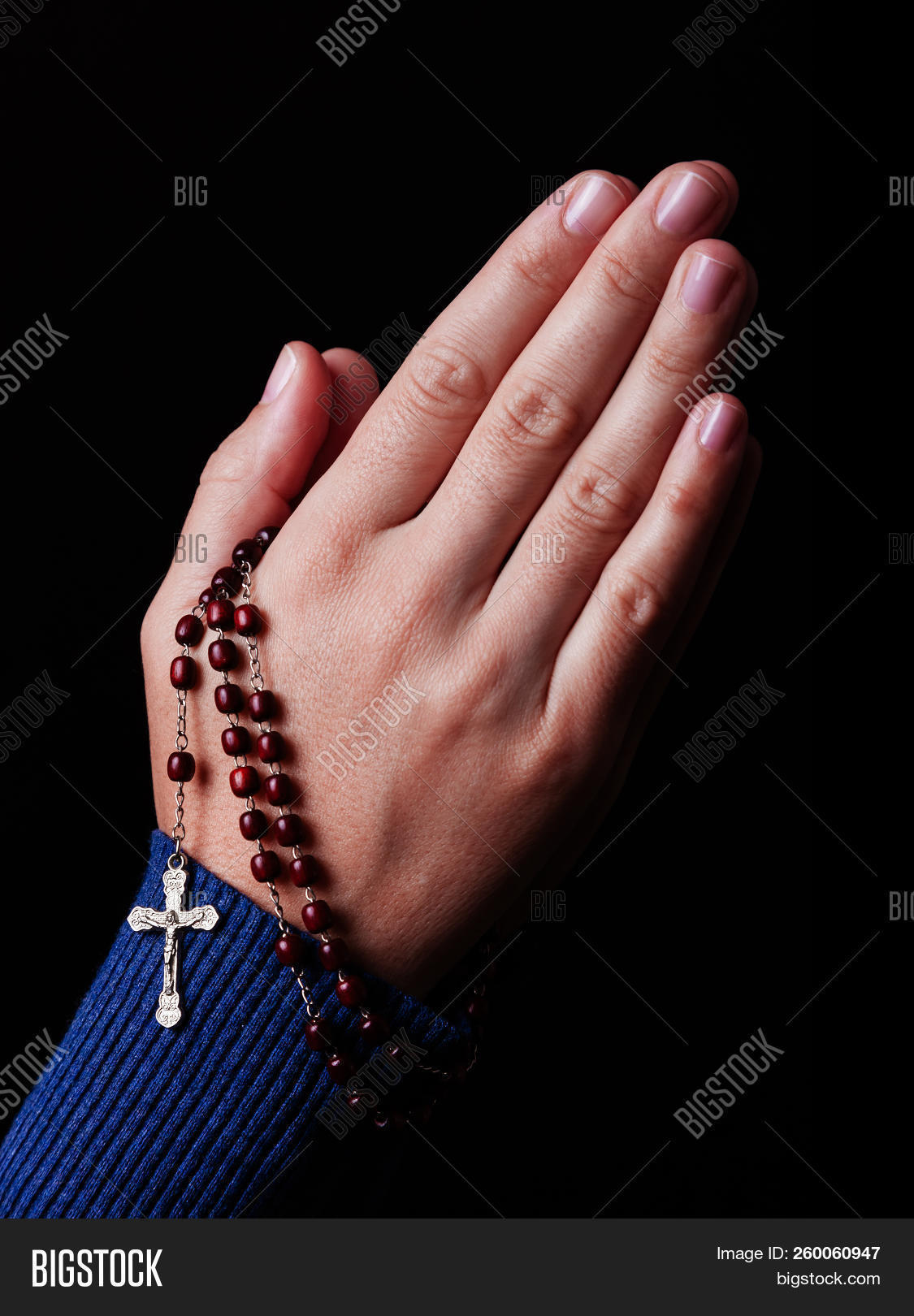 beads,belief,believe,believer,black background,catholic,catholicism,caucasian,christ,christian,christianity,church,close up,closeup,cross,crucifix,faith,faithful,female,god,hands,holding,jesus,jesus christ,meditation,modest,modesty,pray,prayer,praying,profile,religion,religious,rosary,rosary beads,side,side view,spiritual,spirituality,symbol,white,woman,worship