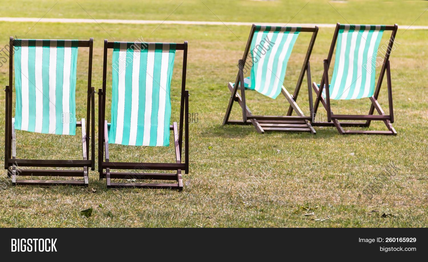 Four Deckchairs For Hire In Hyde Park Westminster London