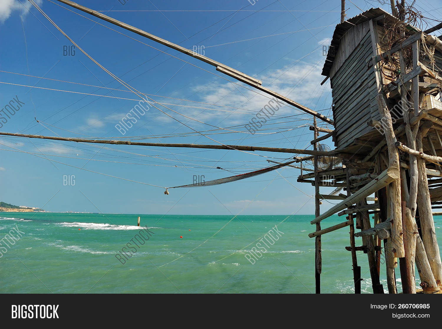 abruzzo,adriatic,ancient,beach,chieti,cloudy,coast,costa,dei,fish,fishing,footbridge,giovanni,house,hut,italian,italy,landscape,mediterranean,nature,old,outdoor,palafitte,picturesque,pilework,reef,rocca,san,scenery,sea,seaboard,seacoast,seascape,seashore,seaside,shack,shore,sky,stilt,trabocchi,trabocco,trabucco,traditional,trebuchet,typical,water