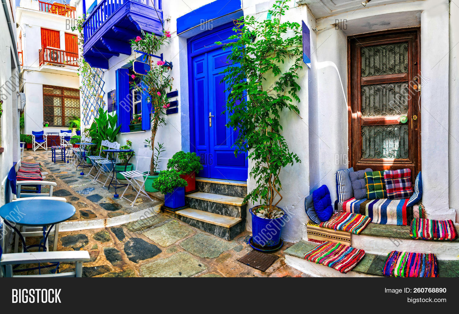 aegean,ancient,architecture,balcony,bar,beautiful,blue,building,cafe,charming,chora,color,colorful,culture,decoration,destination,details,door,europe,european,exterior,facade,floral,flowers,greece,greek,home,house,island,lifestyle,mediterranean,narrow,old,outdoor,shop,skopelos,sporades,steps,street,summer,table,tourism,tourist,town,tradition,traditional,travel,vacation,white,window
