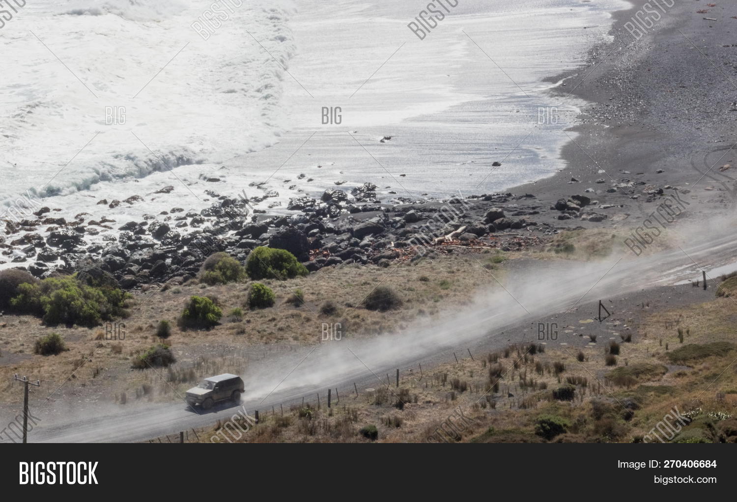 4wd,adventure,background,beach,cape,car,coast,coastal,copy,day,dirt,drive,driving,gravel,landscape,new,no,ocean,outdoor,palliser,people,remote,road,rugged,sea,shore,space,terrain,transport,travel,vehicle,wild,zealand