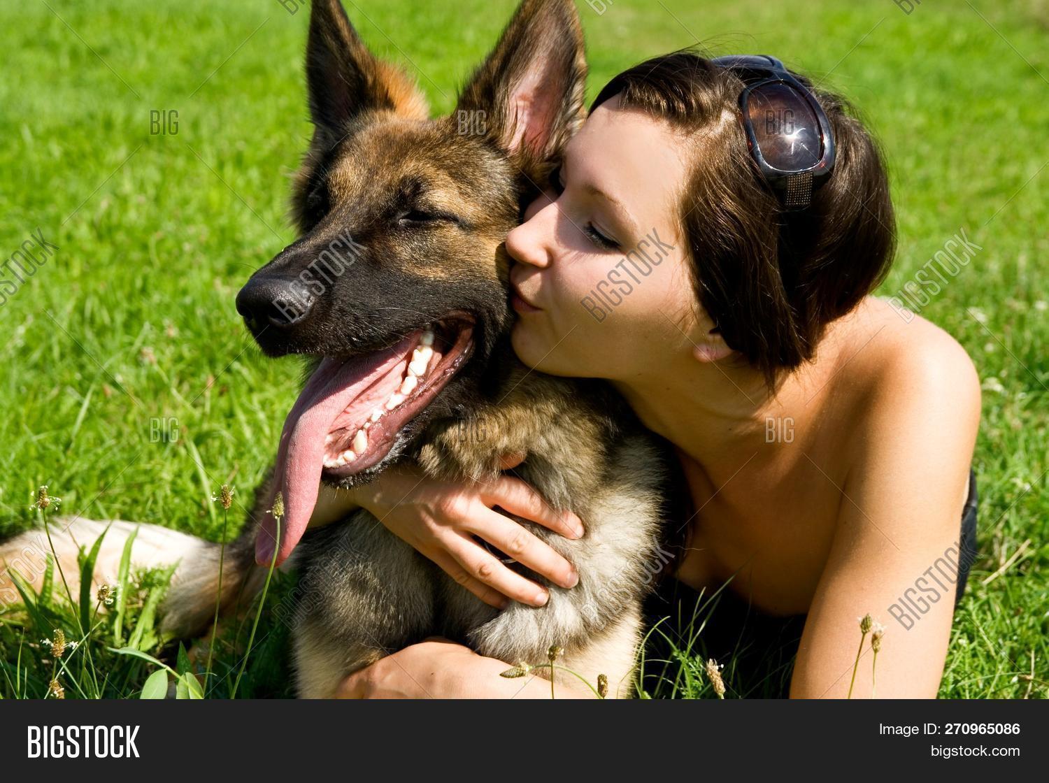 amazing,beautiful,beauty,best,brunette,cute,day,dog,friends,german,girl,grass,lovely,lying,meadow,portrait,shepherd,summer,sunny,young
