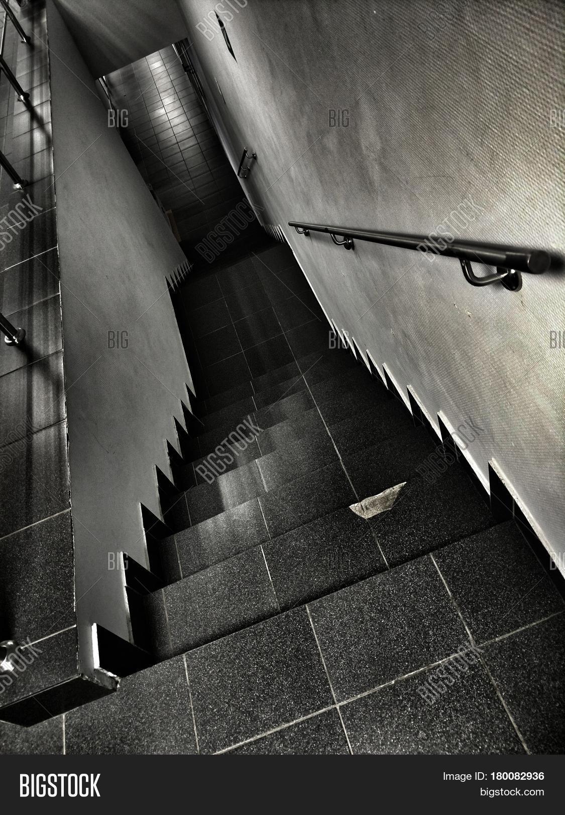 architecture,basement,brick,brickwork,cellar,city,concrete,confined,construction,corridor,dark,dirty,dungeon,floor,footstep,gray,level,masonry,moss,mysterious,mystery,mystic,old,ominous,passage,rock,scary,shadow,solitude,spooky,staircase,stairs,step,stone,subway,tunnel,underground,upward,vault