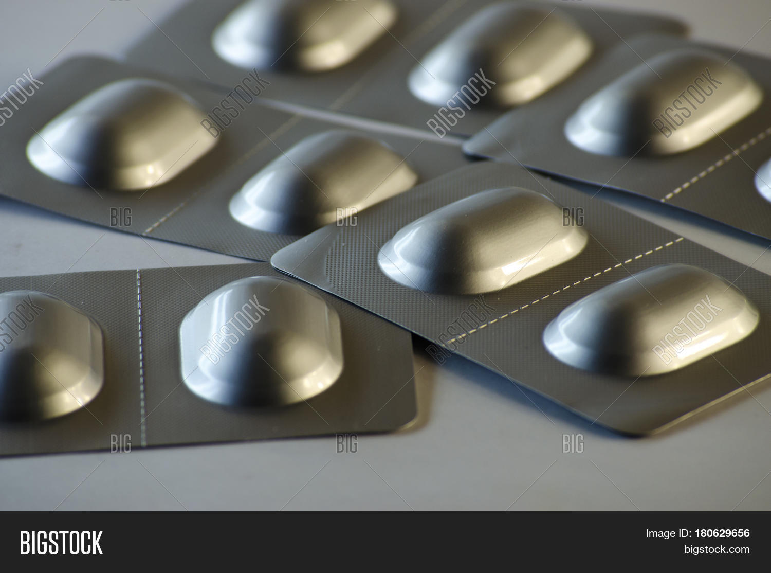 Doctor,Pills,antibacterial,antibiotic,beauty,blister,blur,capsule,close-up,danger,dietary,foil,gray,health,medicines,multivitamins,pack,pain,pharmaceuticals,preparations,tablets,vitamins