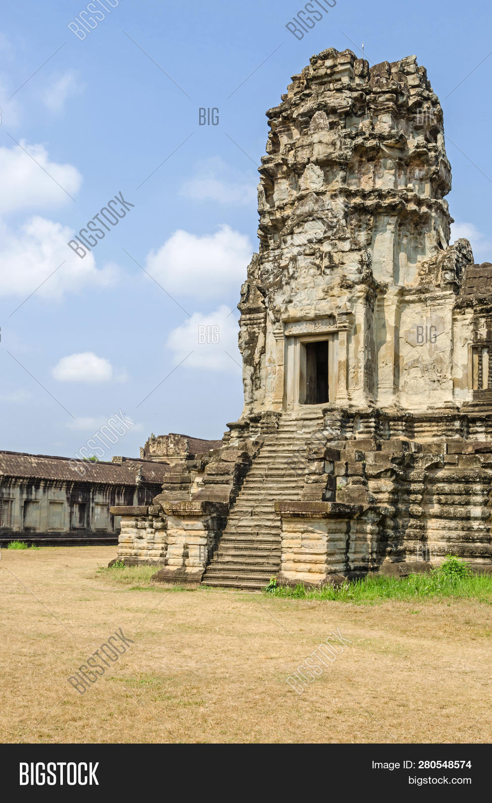 Angkor,Cambodia,Empire,Hindu,Khmer,Meru,Mount,Vishnu,Wat,archaeological,architecture,bas-relief,blocks,bud,carved,characteristic,classical,decorated,deva,devatas,door,entrance,galleried,gate,god,kingdom,lintel,lotus,monument,mountain,mythology,ogival,pediment,preserved,redented,religious,representing,sandstone,shaped,shrine,stairways,steep,style,temple,tower,tympanum,wall