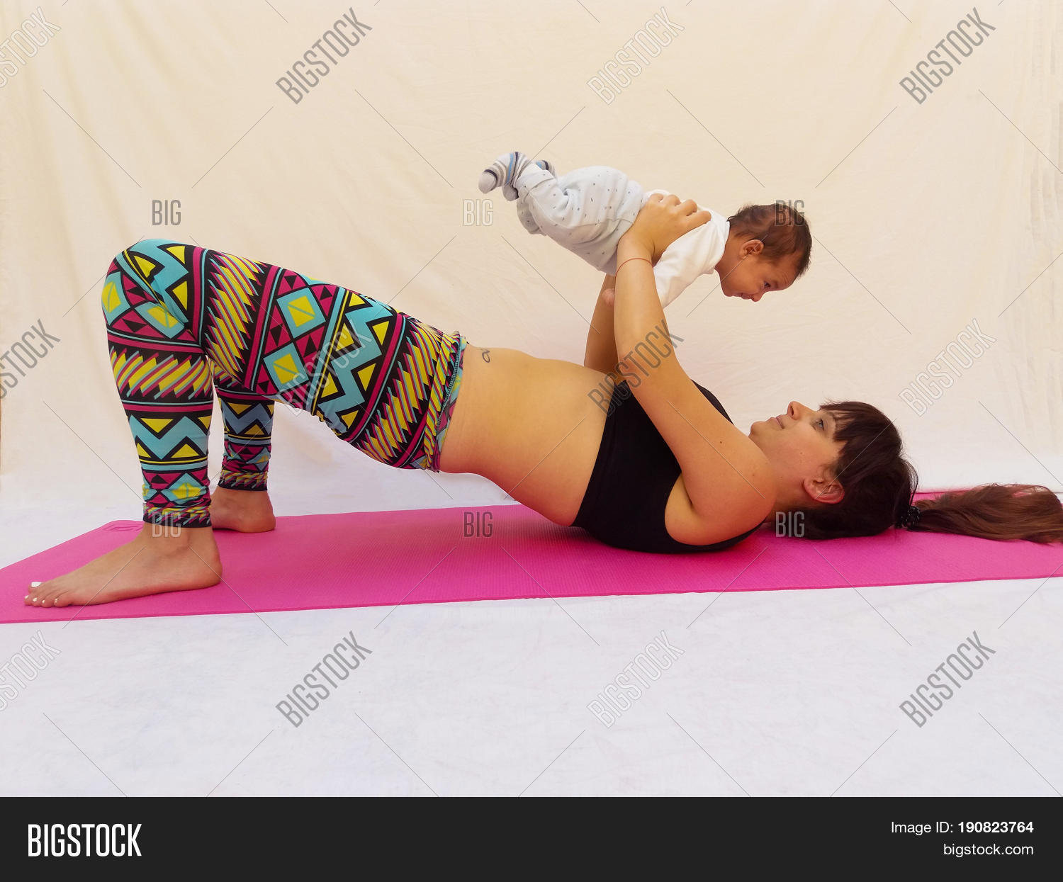 active,activity,baby,ball,child,doing,exercise,exercising,family,female,fit,fitness,girl,gym,gymnastics,happy,health,healthy,home,indoors,infant,kid,lifestyle,mama,mat,mom,mommy,mother,motherhood,mum,mummy,parent,parenthood,people,recreation,shape,slim,smiling,sport,sportswear,toddler,together,train,training,wellness,woman,working,workout,yoga