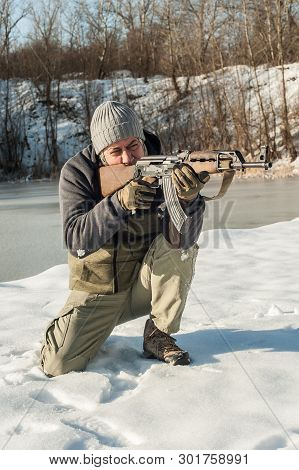 Instructor Demonstrate Body Position Of Rifle Shooting On Shooting Range