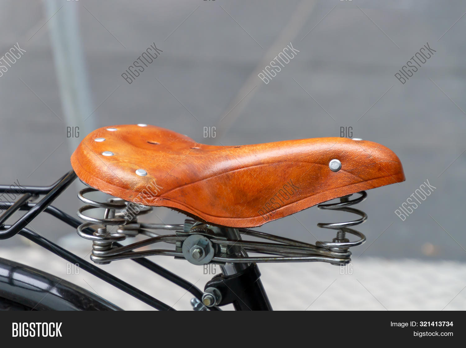 1940-1980,absorber,accessory,adjustable,background,bicycle,bike,biking,brake,brown,classic,clipping,cycle,exercise,gear,healthy,imagery,indoors,isolated,leather,leisure,lifestyle,metal,mounted,nobody,object,old,old-fashioned,path,personal,recreation,reflection,relaxation,retro,retro-styled,ride,saddle,seat,shock,side,sport,steel,transportation,travel,vehicle,view,vintage,wheel,white