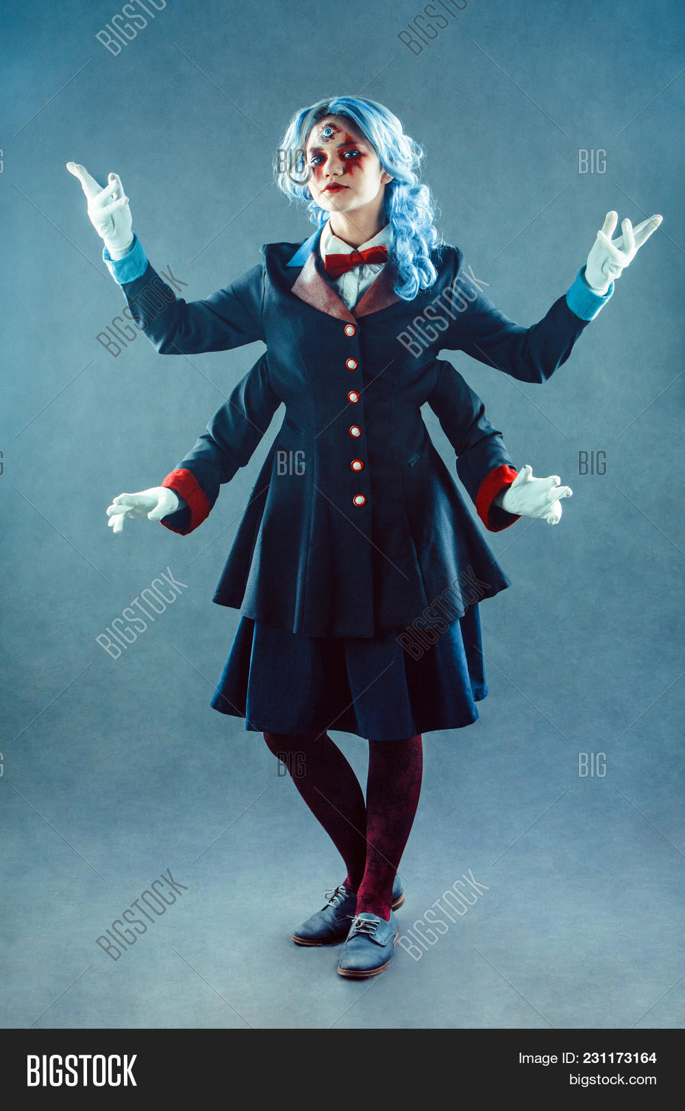 actor,actress,adult,bizarre,blue,carnival,caucasian,character,circus,clothing,comedian,costume,creativity,disguise,eccentric,emotional,entertainment,event,evil,expression,eye,face,fantasy,fun,halloween,human,humor,inviting,looking,make,multihanded,paint,people,performance,person,six-armed,spooky,stage,surreal,surrealism,theatrical,third,troupe,up,woman