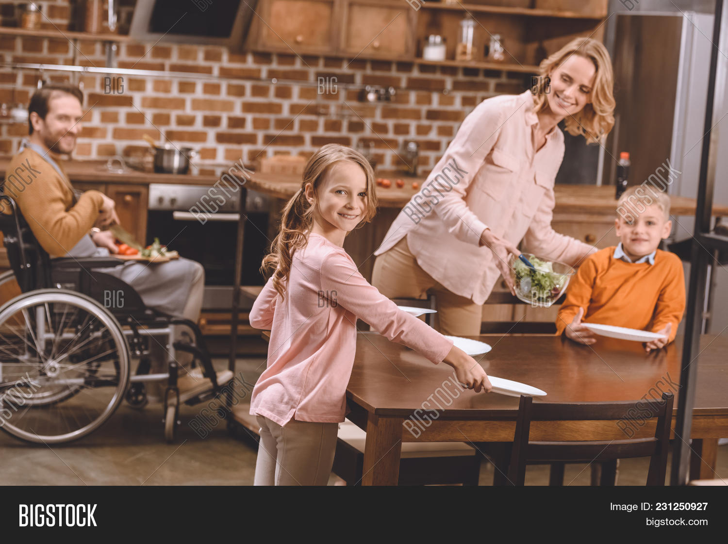 accessibility,at,brother,care,caucasian,childhood,children,cook,cooking,cuisine,cut,daughter,dinner,disability,disabled,disease,european,family,father,female,food,girl,handicap,handicapped,happy,healthcare,home,illness,indoors,kids,kitchen,male,medical,medicine,mobility,mother,parenthood,parents,people,prepare,siblings,sickness,sister,smile,son,table,together,vegetables,wheelchair,woman