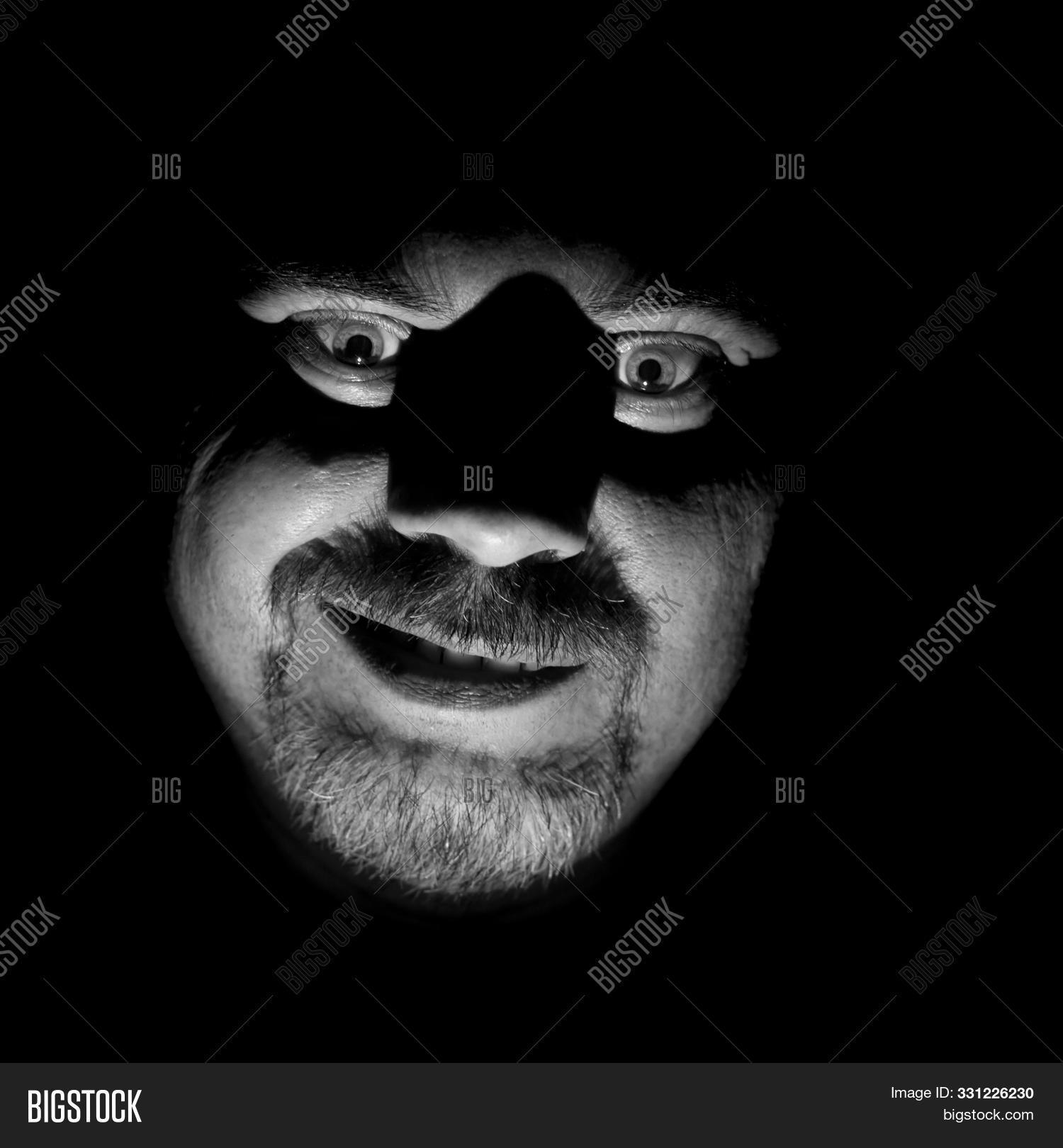 adult,anger,angry,attractive,awful,bad,beard,black,calm,caucasian,concept,crazy,creepy,daemon,danger,dark,death,demon,devil,emotion,evil,expression,expressive,face,fear,guy,head,hell,horror,isolated,lighting,mad,madness,male,man,maniac,night,nightmare,one,people,person,portrait,problem,scary,scream,smile,strange,stress,thriller,unshaven