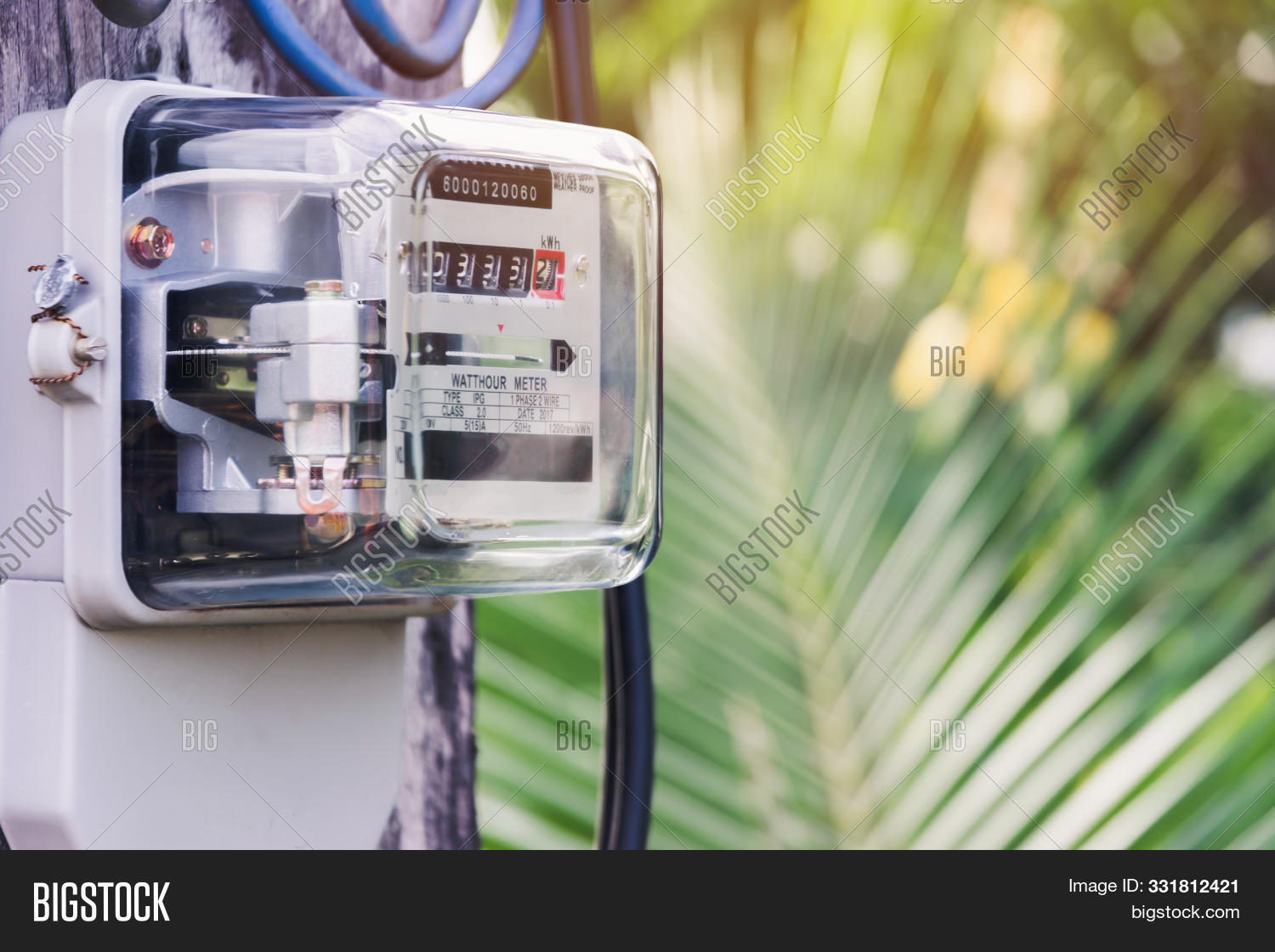 amp,appliance,background,bill,charge,circuit,coil,counter,current,device,dial,eddy,electric,electrical,electrician,electricity,energy,gage,glass,home,hour,house,industrial,instrument,kilowatt,load,measure,meter,monitor,numbers,outdoor,phase,pole,power,rate,reading,readout,supply,technology,three,transformer,tree,uses,utility,volt,voltage,voltmeter,watt,watthour,white