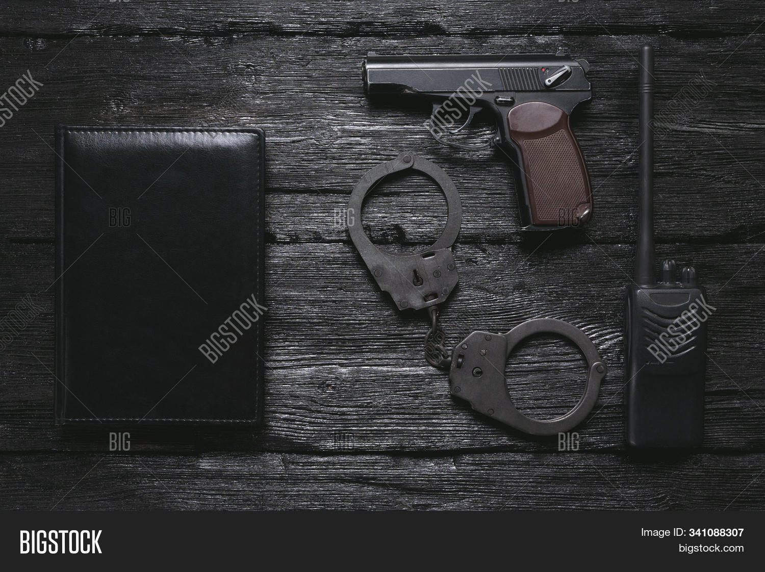 accessory,agency,agent,black,book,bracelet,copy,desk,detective,equipment,espionage,flat,flatlay,gear,gun,handcuffs,handgun,investigation,lay,manacle,mockup,pistol,police,portable,radio,secret,security,service,space,spy,station,surveillance,table,template,top,view,weapon,work
