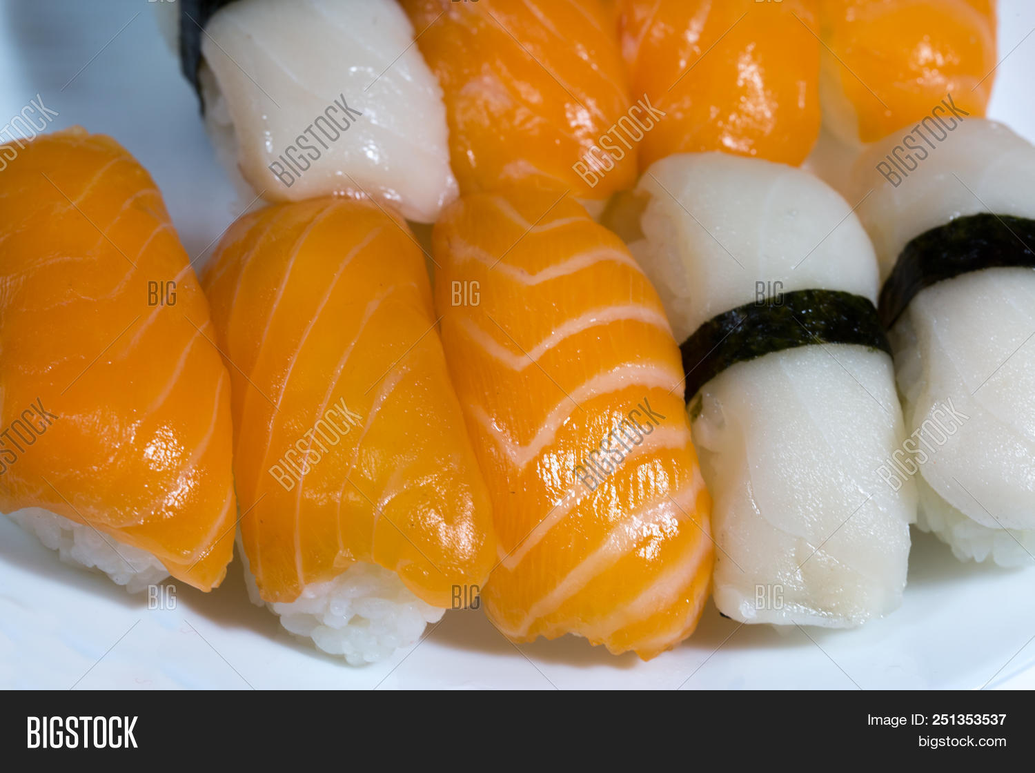 Asia,assortment,background,bar,bright,butterfish,close,closeup,colorful,cuisine,delicious,diet,dinner,east,eco,fish,food,fresh,healthy,japan,japanese,juicy,meal,menu,natural,nigiri,nori,nutrition,orange,organic,plate,protein,raw,restaurant,rice,salmon,sashimi,seafood,seaweed,snack,supper,sushi,susi,tasty,traditional,uncooked,up,white