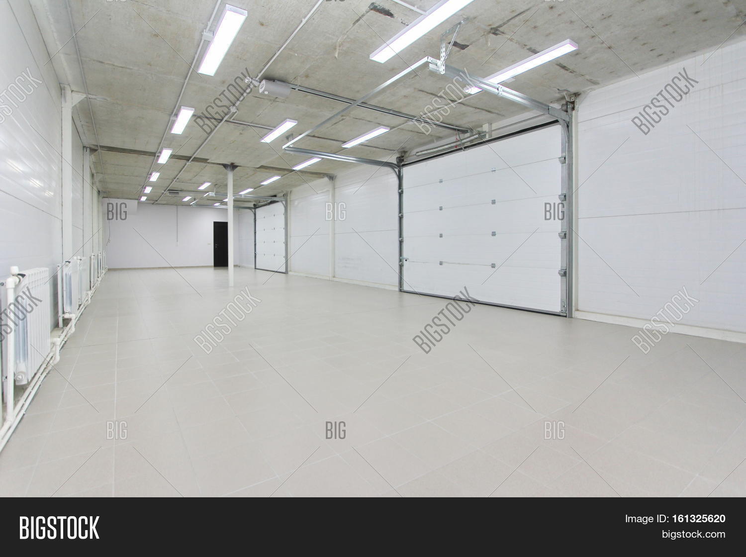 architectural,area,basement,buildings,built,business,ceiling,clean,color,column,commercial,compartment,concrete,construction,design,detail,doors,empty,entrance,equipment,factory,floor,garage,horizontal,house,individuality,indoors,industry,interior,iron,large,light,metal,perspective,retail,room,row,space,steel,storage,store,structure,technology,underground,urban,wall,warehouse,white,workshop