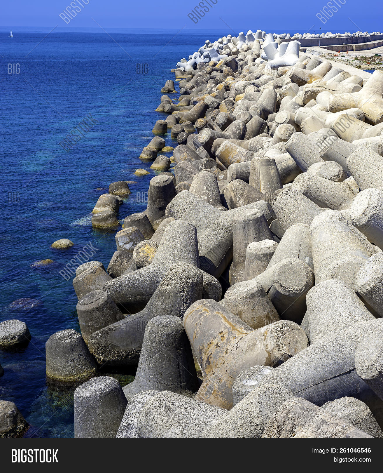 background,barrier,block,blue,breakwater,coast,coastal,coastline,concrete,construction,embankment,harbor,heavy,ocean,port,protect,protection,safety,sea,seawall,tetrapod,wall,water,wave