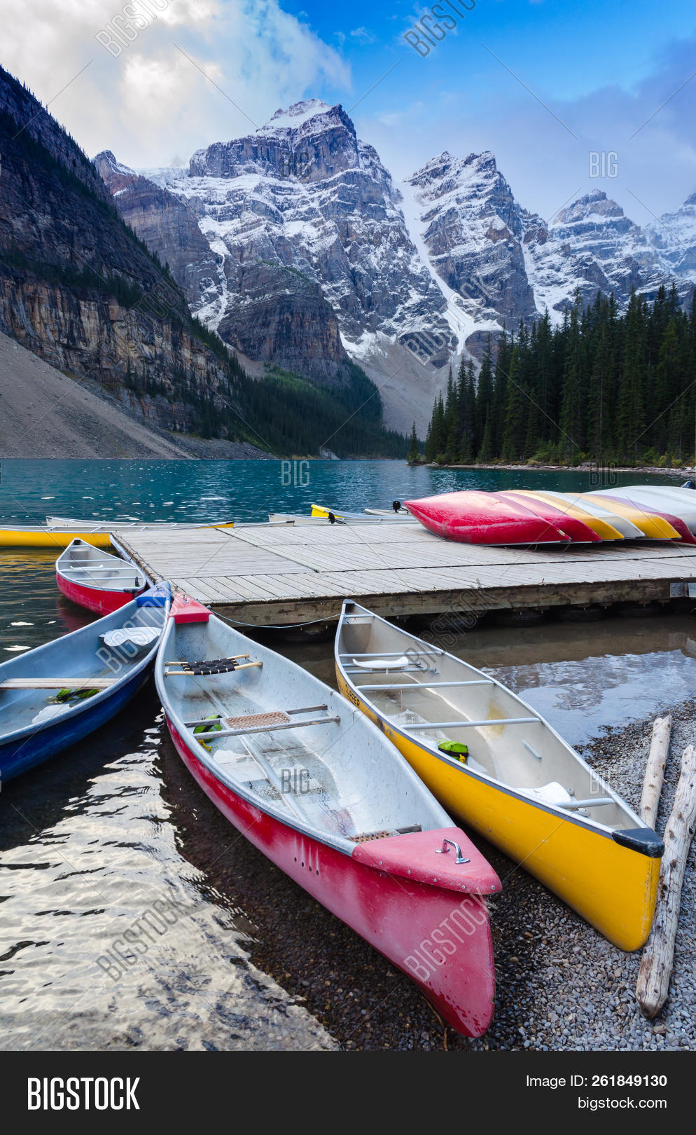 Banff Dock Colorful Canoes Docked At Moraine Lake In Banff National Park, Canada ...