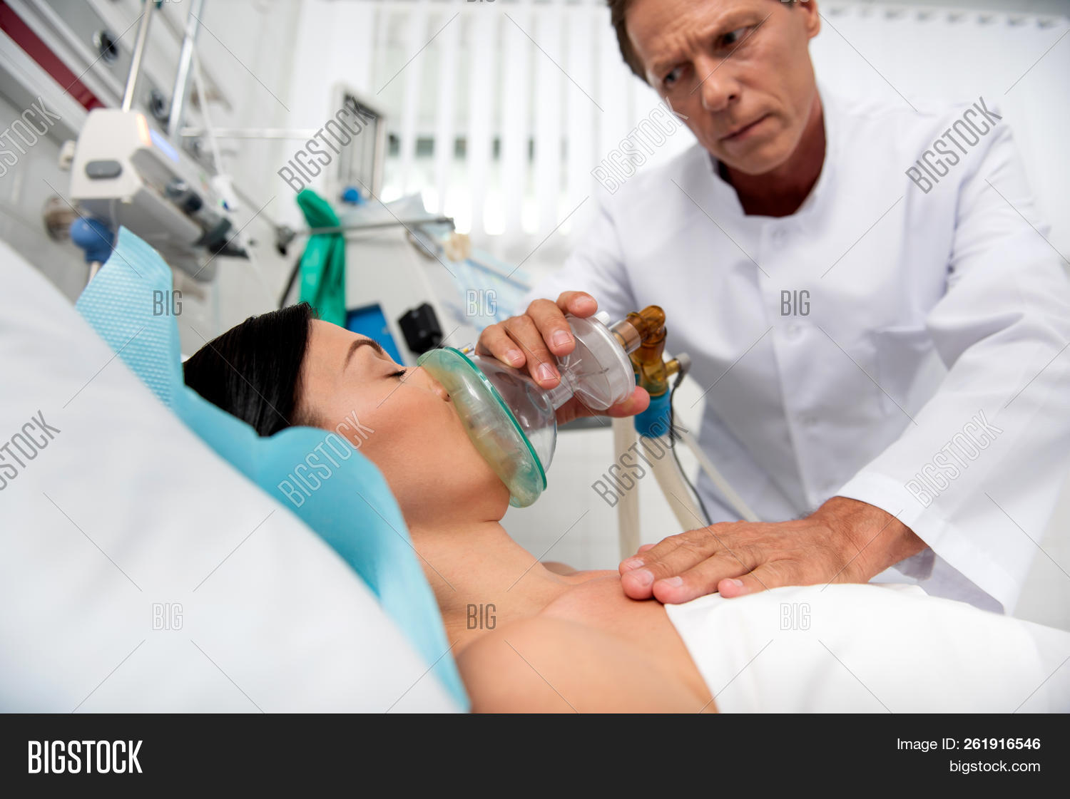 adult,bed,breathe,care,caucasian,clinic,clinical,coat,coma,cure,disease,doctor,emergency,equipment,female,gentleman,hand,health,healthcare,hospital,illness,indoors,intensive,lab,lie,look,male,man,mask,mechanical,medical,medicine,monitor,oxygen,paramedic,patient,resuscitation,room,sick,sterile,therapist,therapy,touch,treatment,unconscious,ventilator,ward,white,woman,young