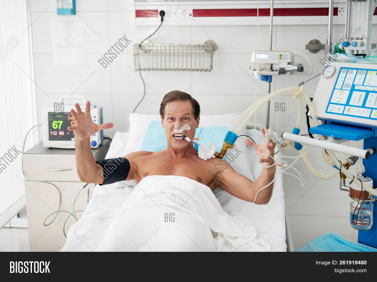 air,anger,annoyed,arm,bed,blood,breath,chest,clinic,clinical,cure,device,display,emergency,emotional,equipment,expression,furious,gesture,grimace,hand,health,healthcare,hospital,hospitalize,illness,lie,machine,man,mechanical,medical,medicine,monitor,oxygen,pain,patient,pressure,pulse,rage,respiratory,room,scream,sick,therapy,treatment,tube,ventilation,ventilator,ward,white