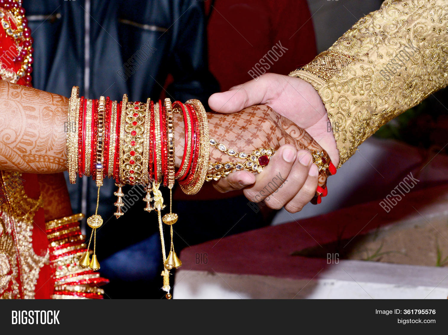hand, 																					couple, 																					commitment, 																					engagement, 																					hindu, 																					indian, 																					marriage, 																					romance, 																					together, 																					bride, 																					groom, 																					henna, 																					love, 																					female, 																					holding, 																					celebration, 																					asian, 																					culture, 																					traditional, 																					ceremony, 																					husband, 																					india, 																					jewelry, 																					married, 																					partnership, 																					romantic, 																					tradition, 																					people, 																					man, 																					woman, 																					colorful, 																					beautiful, 																					faith, 																					gold, 																					hold, 																					standing, 																					togetherness, 																					two, 																					male, 																					close-up, 																					happy, 																					weddings, 																					photos, 																					bonding