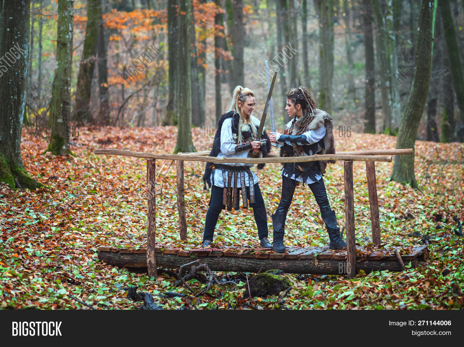 Scandinavian,Viking,aggressive,armed,attack,background,barbarian,battle,blonde,braided,brunette,brutal,cinema,cinematic,collar,costume,female,fight,fighting,footbridge,forest,fur,furious,girls,hair,lagertha,makeup,models,movie,north,northern,people,princess,raid,ruthless,scary,sword,threatening,two,war,warrior,weapon,women,woods