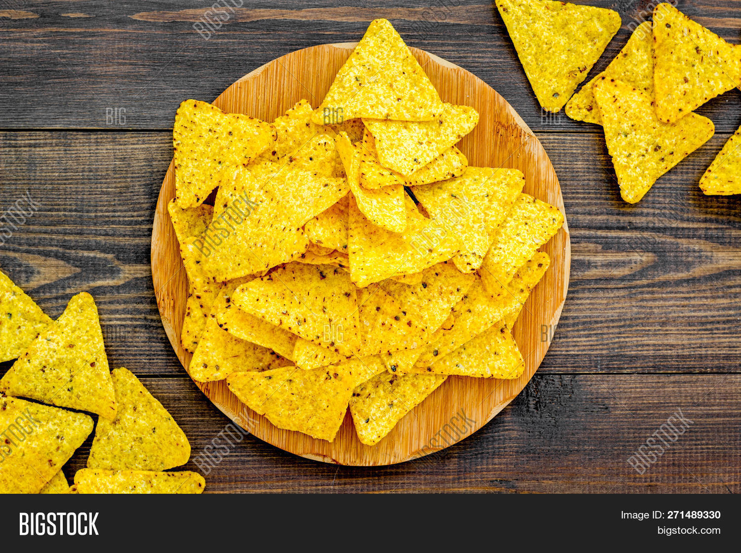 background,calories,chip,crisp,crispy,crunchy,delicious,eat,fast,fastfood,fat,fatty,flat,food,fried,heap,junk,lay,lunch,meal,nachos,party,potato,prepared,salt,salted,salty,slice,snack,spicy,tasty,top,triangle,triangular,unhealthy,view,wooden