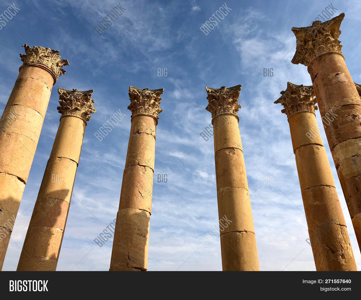 afternoon,ancient,architecture,big,blue,carved,civilization,classical,clouds,column,crumbling,crumbling building,day,desert,detail,east,grand,high,high heels,historic,history,hot,imposing,jerash,jordan,large,light,masonry,middle,old,past,roman,roman ruins,ruin,ruined building,ruined city,sky,sky clouds,stone,temple,tourism,town,travel,view,view beautiful