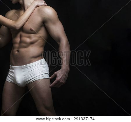 Male Swimwear, Shorts, Underwear, Concept. Male Muscular Body In White Sexy Underpants. Handsome Man