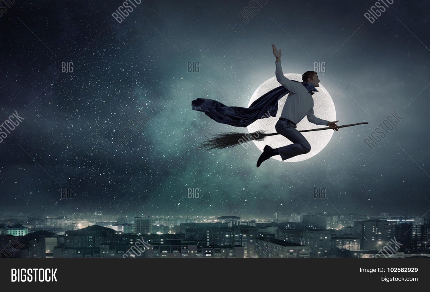 abstract,adult,besom,boss,brave,broom,business,businessman,cape,company,concept,director,evening,fly,hero,hold,human,late,male,man,mature,night,office,person,professional,protect,resque,shirt,suit,super,tie,transport,transportation,witch,worker