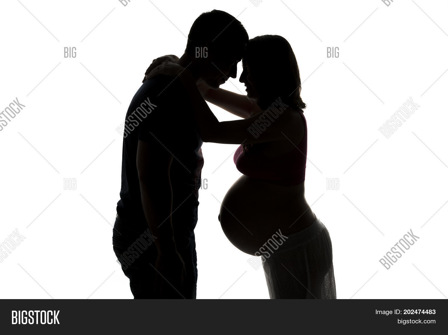 anticipation,baby,backlit,birth,black,body,caring,child,close,couple,daughter,family,father,forehead,love,lover,mother,naked,newborn,parents,pregnant,shadow,shodow,skin,smiling,son,touching,unborn,white