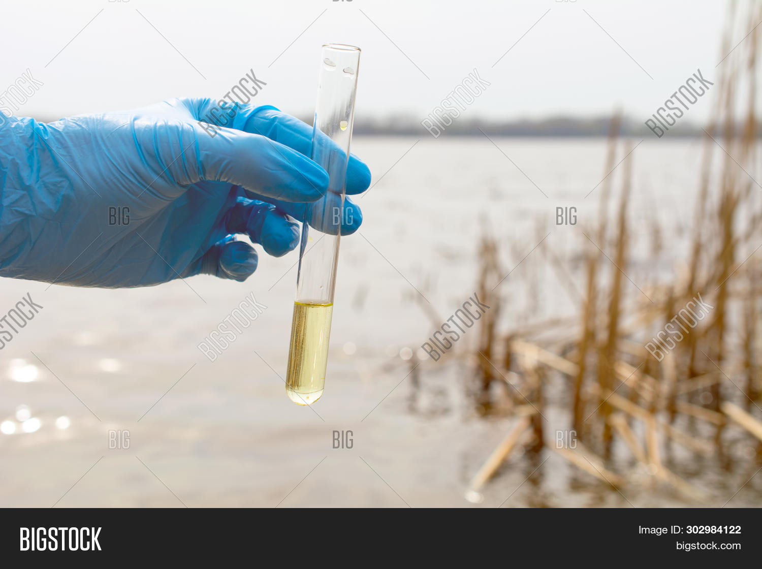 analysis,bacteria,biologist,biology,biotechnology,chemical,chemistry,concept,dirty,ecologist,ecology,environment,equipment,experiment,flask,hand,health,laboratory,lake,nature,outdoors,pollution,professional,protective,quality,research,researcher,river,sample,sampling,science,scientific,scientist,substance,test,testing,toxic,tube,water
