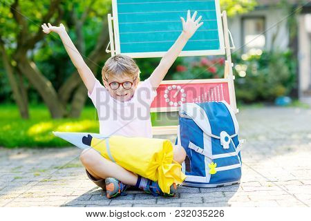 Happy Little Kid Boy With Gl Sitting By Desk And Backpack Or 5 6