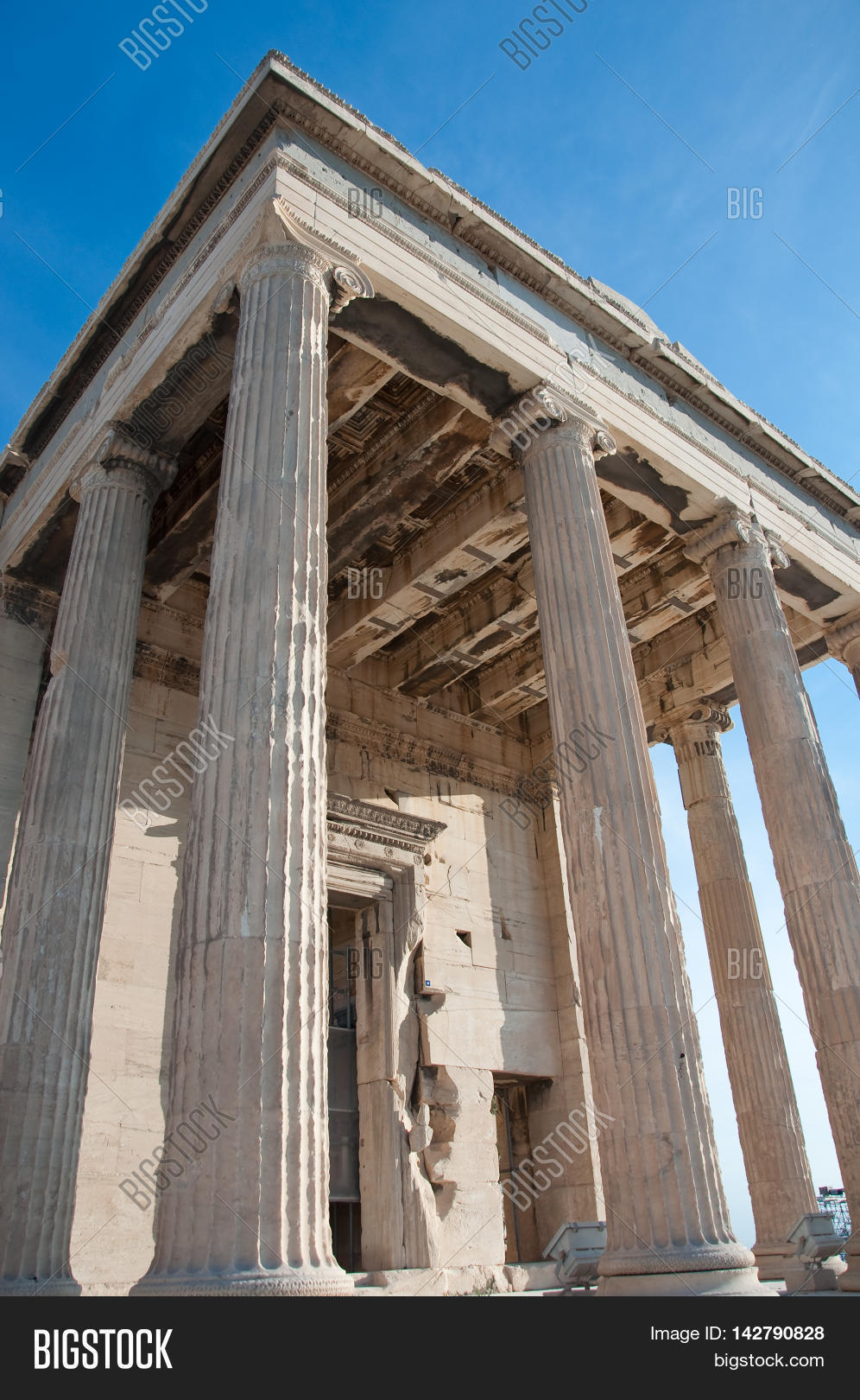 Athena,Athens,Attica,Europe,Greece,Greek,Parthenon,Poseidon,acropolis,adventure,ancient,archeology,architecture,blue,building,caryatides,caryatids,coffering,column,construction,culture,day,detail,erechtheion,erechtheum,erichthonius,famous,goodness,historic,history,holiday,journey,landmark,marble,monument,mythology,old,people,pillars,propylaea,ruins,sculpture,sky,stone,temple,tour,tourism,travel