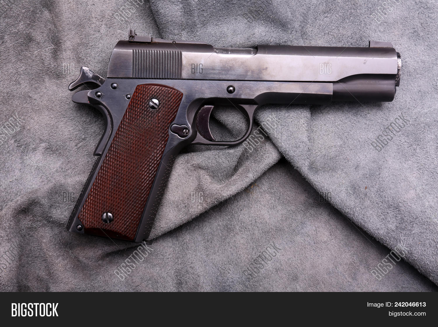 45,45 caliber,ammunition,army,army guns,automatic,background,barrel,bullet,caliber,close-up,constitution,crime,danger,dangerous,defense,equipment,firearm,government,government icon,grip,gun club,gun collection,gun control,gun safety,gunmetal,hand cannon,handgun,handgun training,handguns,isolated,leather background,leather texture,legendary,maga,marine survey,metal,military,nra,pistol,protection,safety,security,semi-auto,semi-automatic,shot,silver,trigger,war,weapon