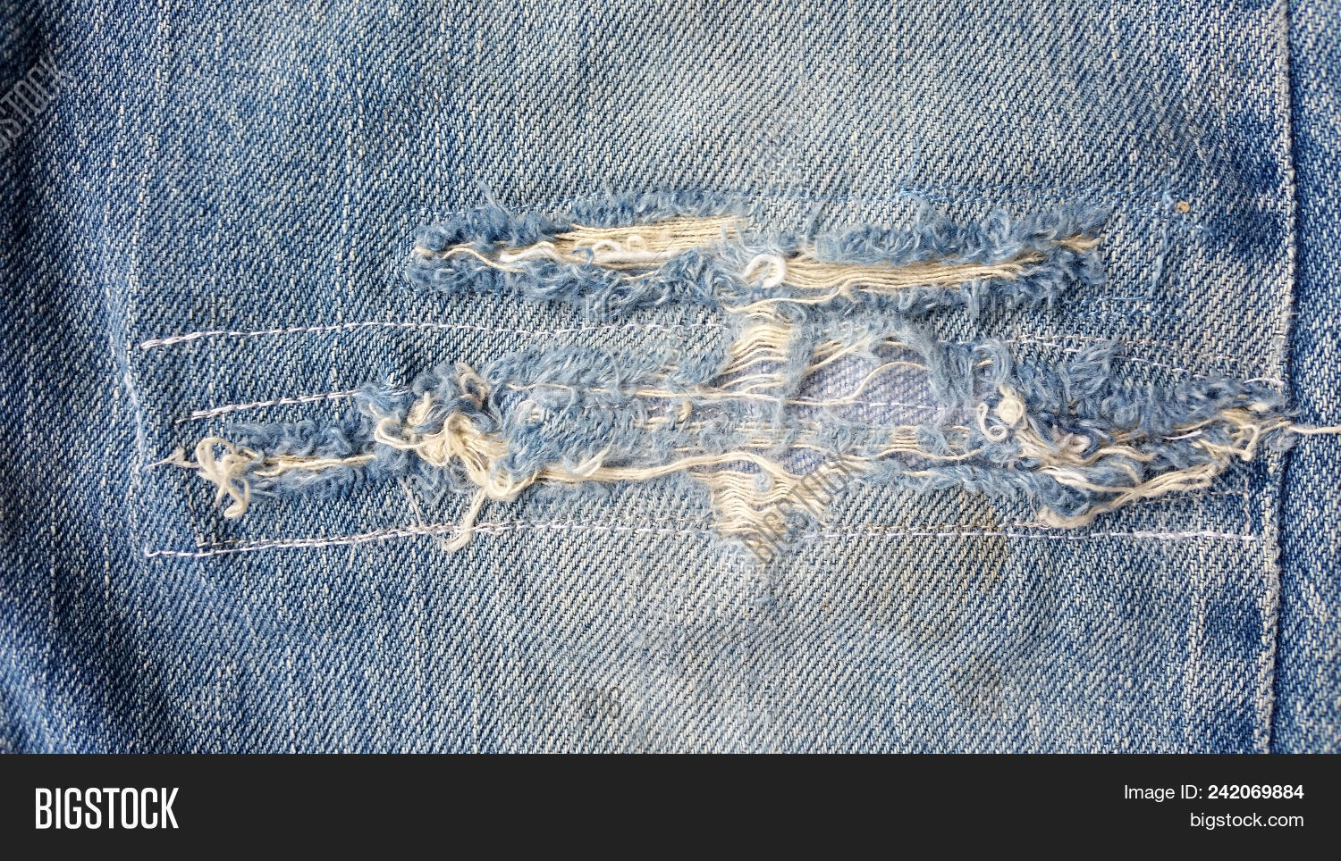 background,backgrounds,blue,body,casual,close-up,cloth,clothing,cotton,damaged,denim,design,detail,details,fabric,fashion,fiber,fray,frayed,funky,garment,grungy,hole,horizontal,jeans,macro,material,modern,nobody,obsolete,old,outdoors,pants,part,patch,pattern,rough,seam,sewing,stitching,style,sunlight,textile,textured,thread,torn,worn,woven,young,youth