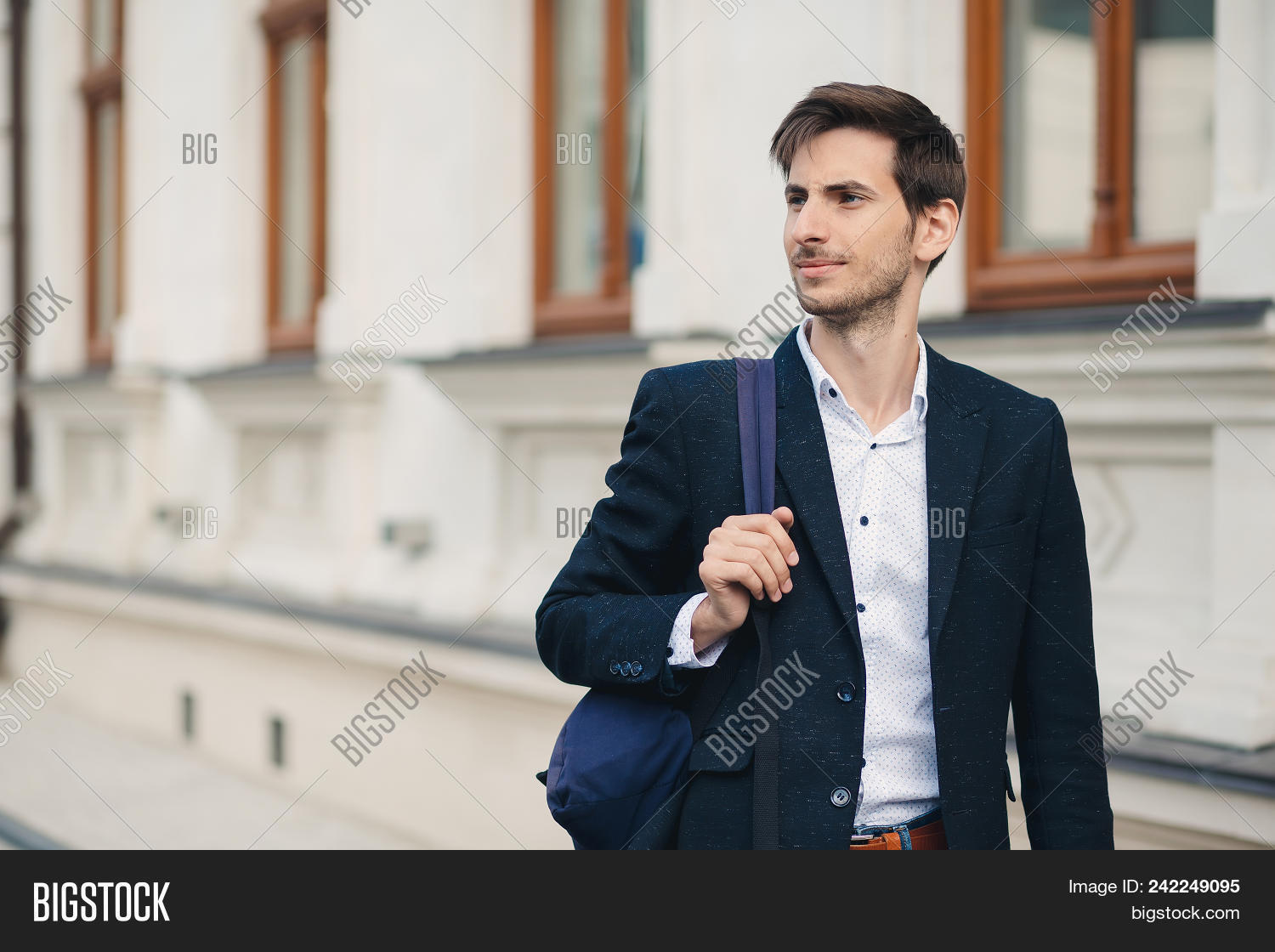 holding backpack straps