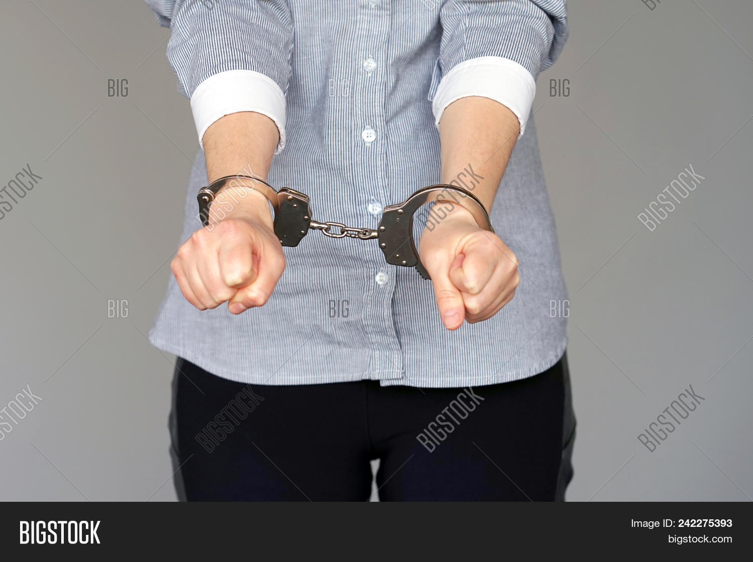 adult,arrest,black,bondage,bracelet,business,captive,chain,concept,convict,crime,criminal,cuffs,culprit,custody,fraud,freedom,gangster,guilt,hand,handcuff,handcuffed,human,isolated,jail,justice,law,legal,lock,man,metal,offender,person,police,prison,prisoner,problems,punishment,security,suspicion,system,thief,trapped,violence,white,woman