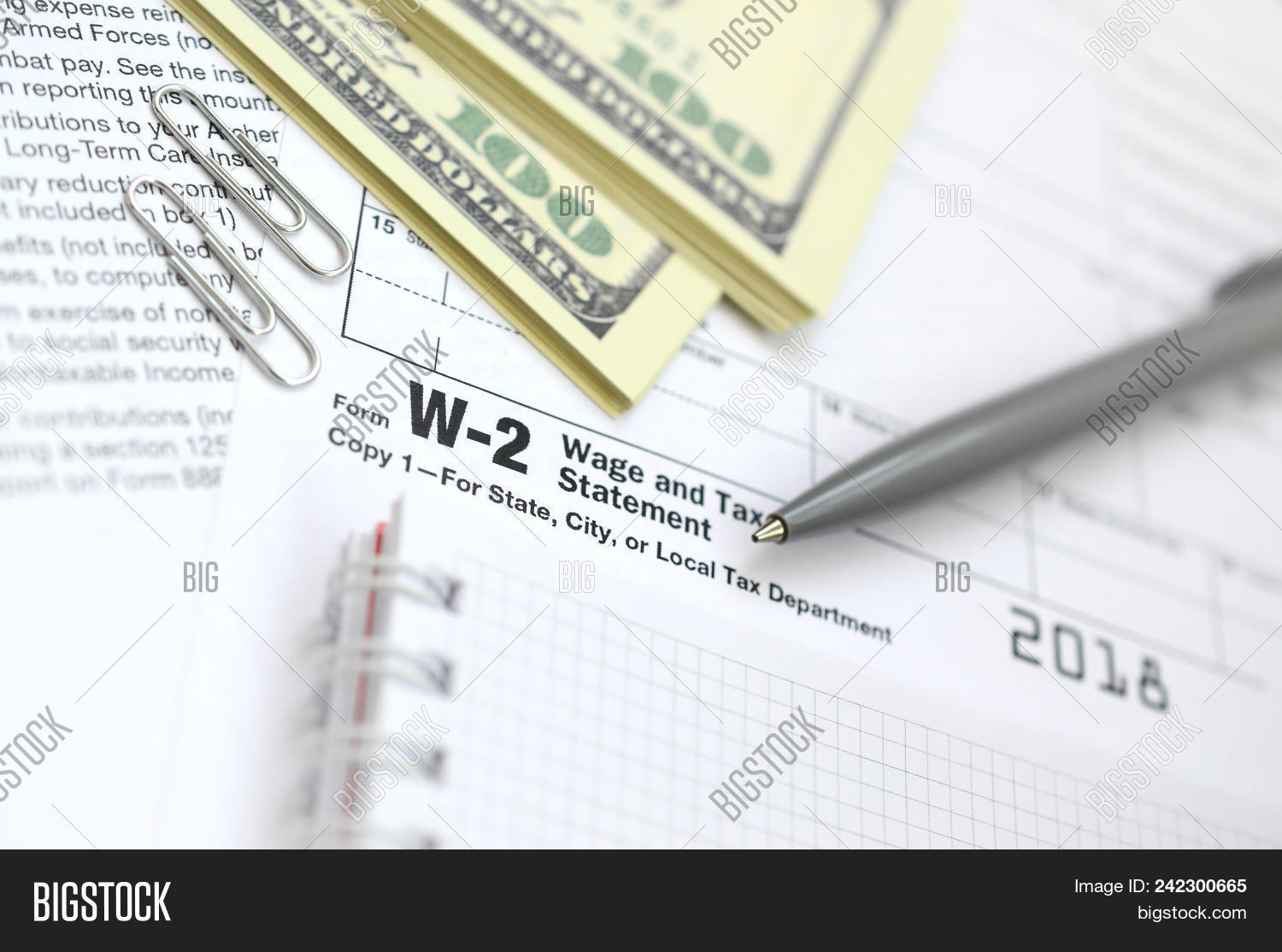 annual,application,april,background,business,buying,closeup,currency,debt,document,earnings,employee,file,finance,financial,form,government,home,irs,money,notebook,number,office,owe,paper,paperwork,paying,pen,plan,preparation,refund,return,savings,statement,tax,taxes,time,treasury,w,w-2,w2,wage,wealth,white