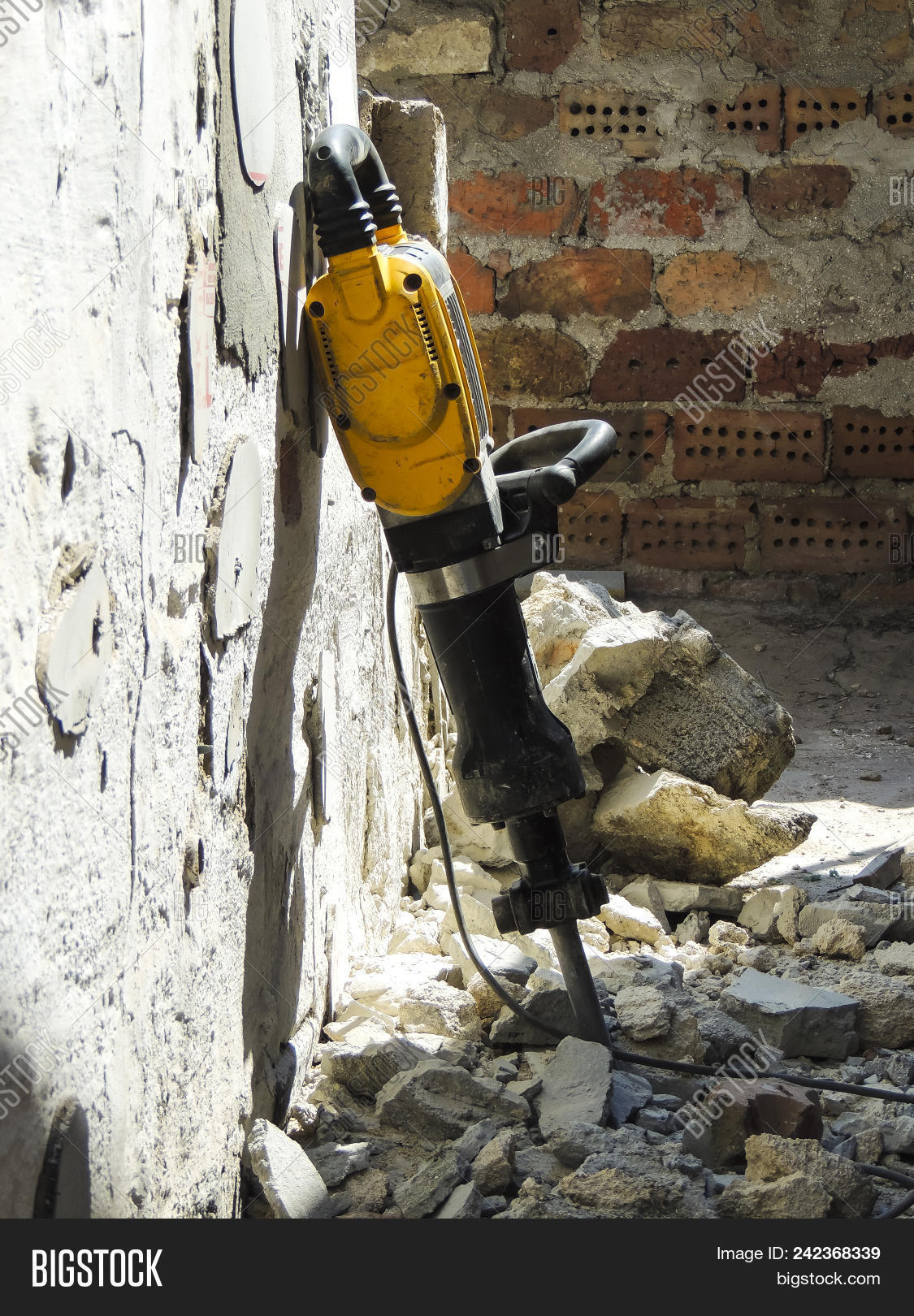action,asphalt,background,break,breaker,brick,builder,concrete,construction,debris,demolition,destroy,destruction,drill,drilling,electric,equipment,hammer,heavy,home,house,industrial,industry,jack,jackhammer,job,labor,machine,machinery,man,orange,outdoor,pavement,plug,pneumatic,power,professional,repair,road,safety,site,tool,wall,white,work,worker,yellow